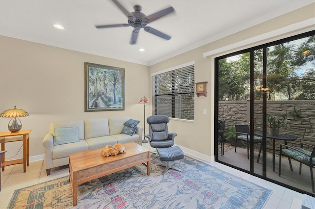 tiled living room with ceiling fan and ornamental molding