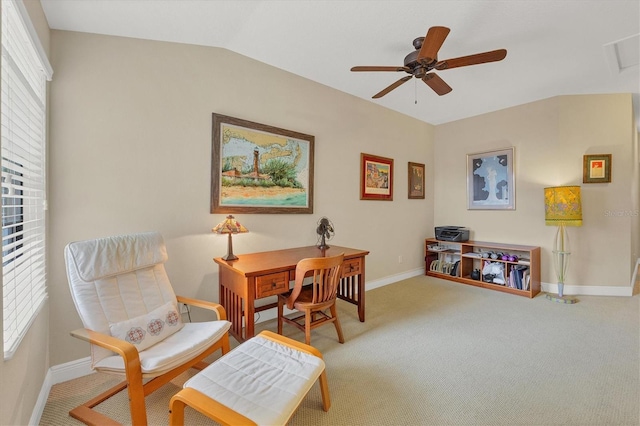 living area with carpet, ceiling fan, and vaulted ceiling