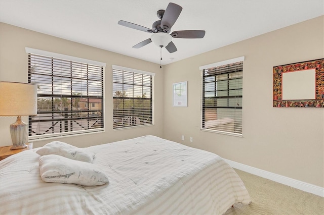 bedroom with carpet and ceiling fan