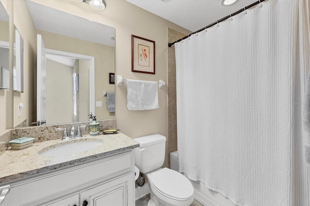 full bathroom featuring vanity, shower / bath combo, and toilet