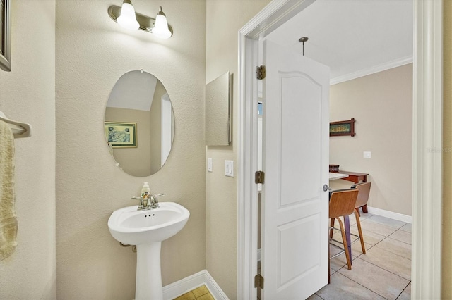 bathroom with tile patterned floors and ornamental molding