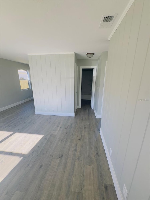 spare room featuring hardwood / wood-style floors