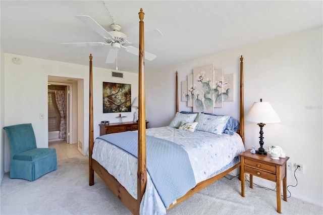 bedroom featuring ceiling fan and light colored carpet