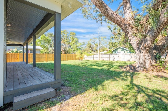 view of yard with a deck