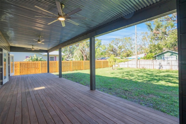 wooden terrace with a yard