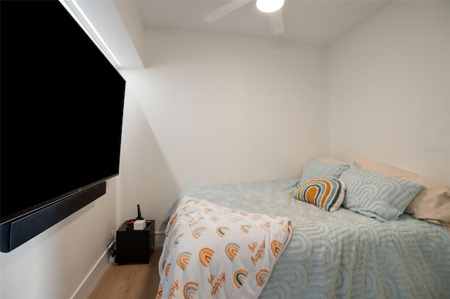 bedroom featuring ceiling fan and light hardwood / wood-style floors