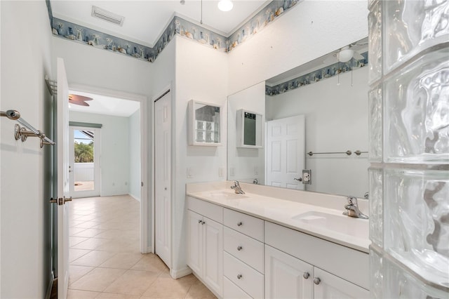 bathroom featuring tile patterned flooring and vanity