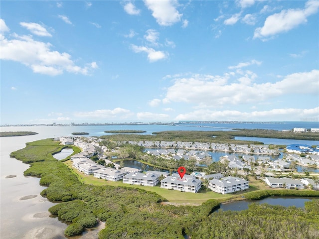 drone / aerial view with a water view