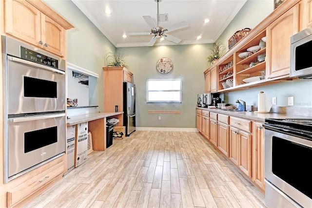 kitchen featuring ceiling fan, light brown cabinets, ornamental molding, and appliances with stainless steel finishes