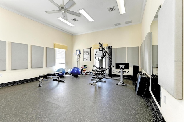 exercise room with crown molding and ceiling fan