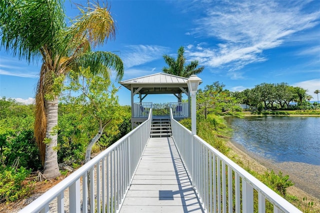 view of home's community featuring a gazebo and a water view