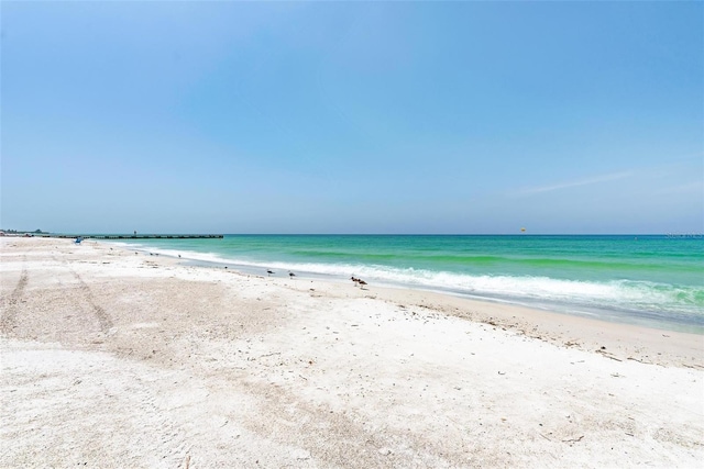 view of water feature with a beach view