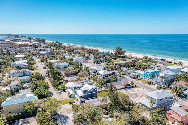 bird's eye view featuring a beach view and a water view