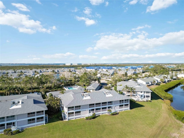 bird's eye view with a water view