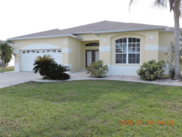 ranch-style home with a front yard and a garage