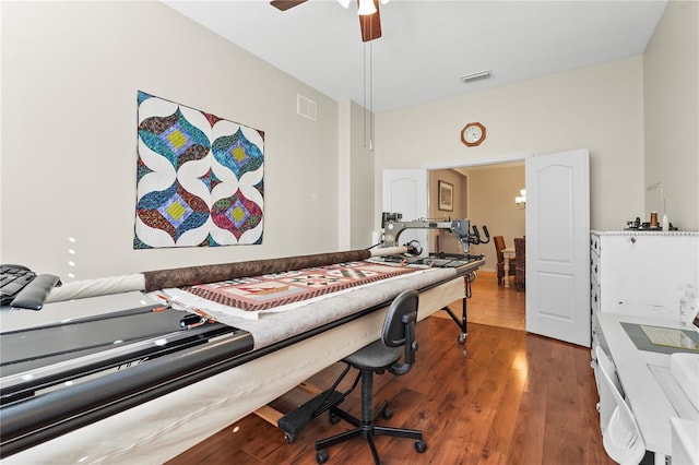 bedroom featuring hardwood / wood-style flooring and ceiling fan