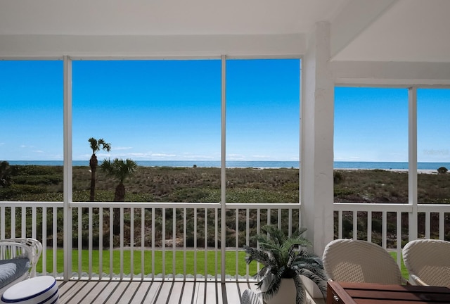 sunroom with a water view