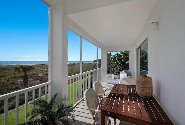 balcony featuring a water view