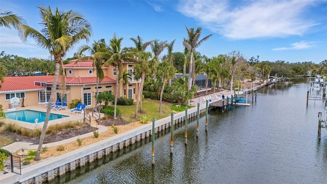 view of water feature with a dock