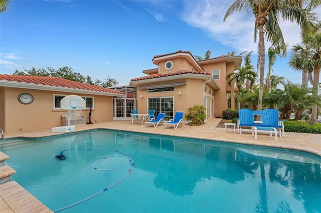 rear view of house featuring a patio