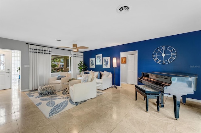 living room with ceiling fan