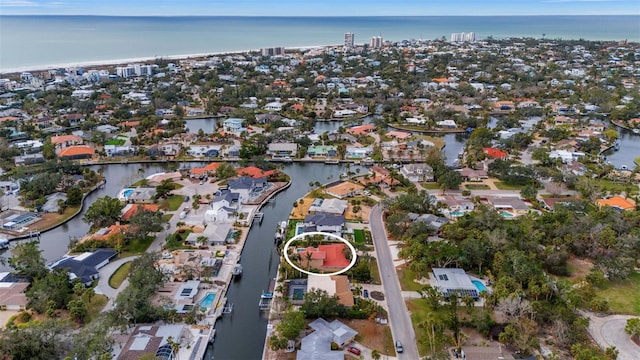 aerial view with a residential view and a water view