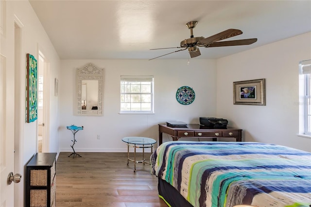 bedroom featuring ceiling fan and hardwood / wood-style floors