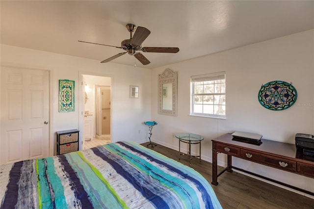 bedroom featuring ceiling fan, hardwood / wood-style floors, and ensuite bath