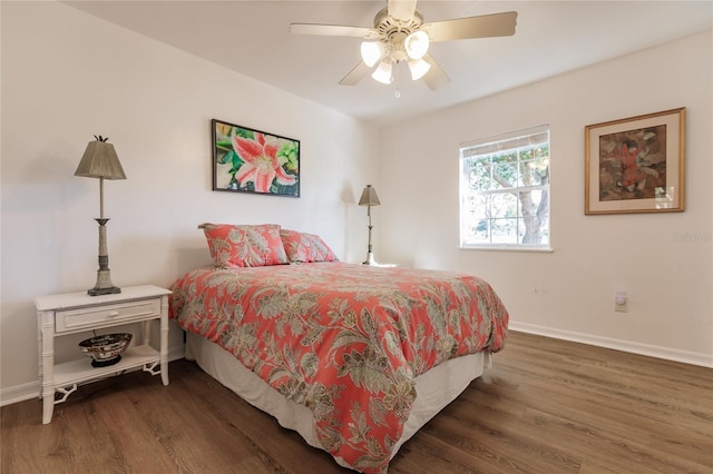 bedroom featuring ceiling fan and dark hardwood / wood-style flooring