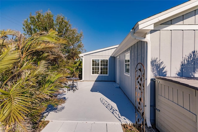 entrance to property with a patio area