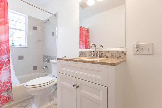 full bathroom with tile patterned floors, vanity, tasteful backsplash, toilet, and shower / bath combo