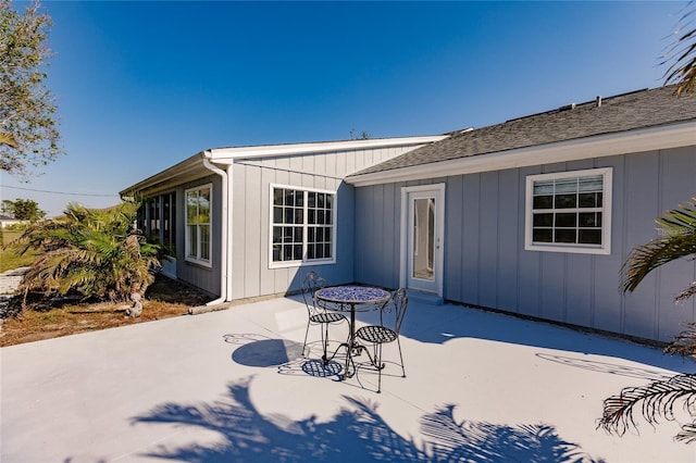 rear view of house featuring a patio