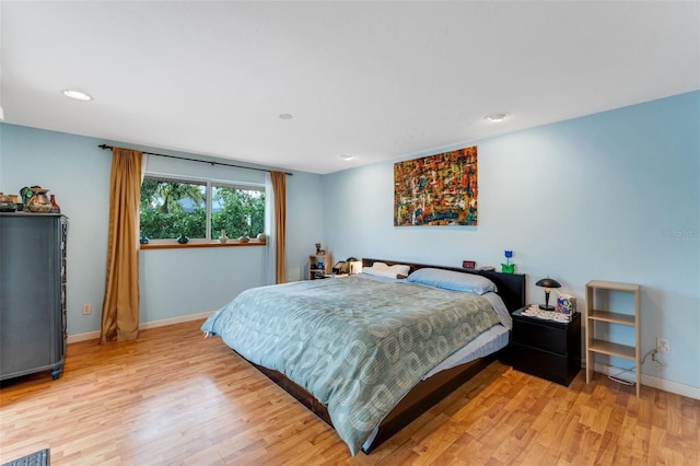 bedroom featuring light hardwood / wood-style flooring