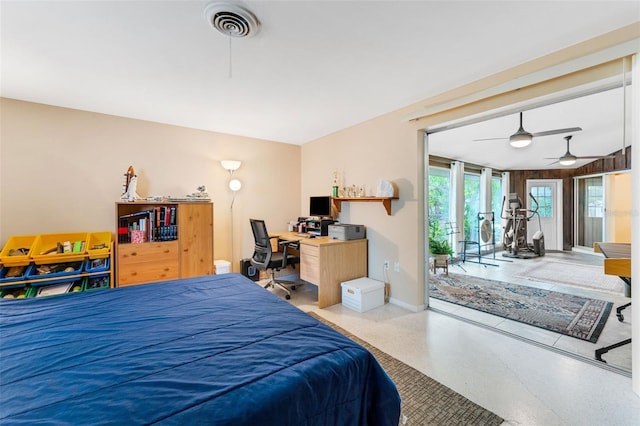 bedroom featuring access to exterior and ceiling fan