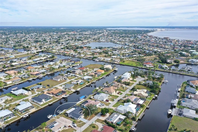 128 Sinclair St SE, Port Charlotte, FL 33952 - drone / aerial view with a water view