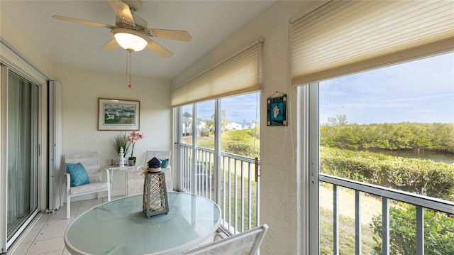 sunroom / solarium with ceiling fan