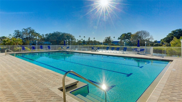 view of pool featuring a patio