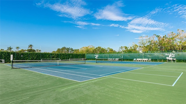 view of sport court featuring basketball hoop