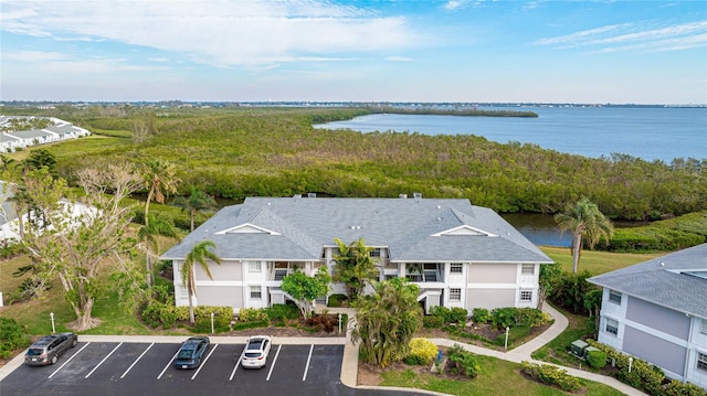 bird's eye view with a water view