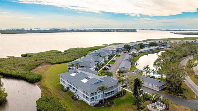 bird's eye view with a water view