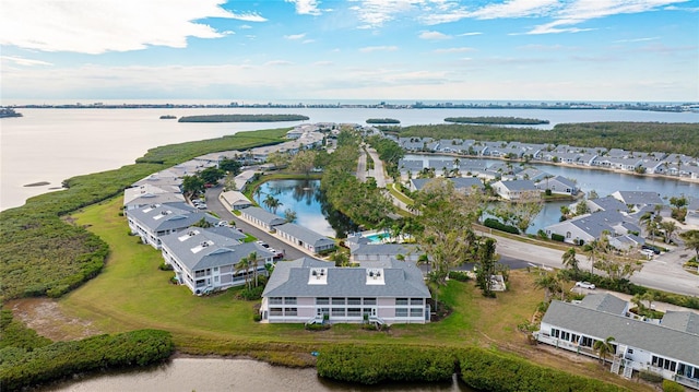 bird's eye view with a water view