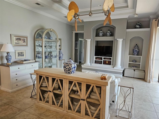 dining space with ornamental molding, decorative columns, and light tile patterned floors