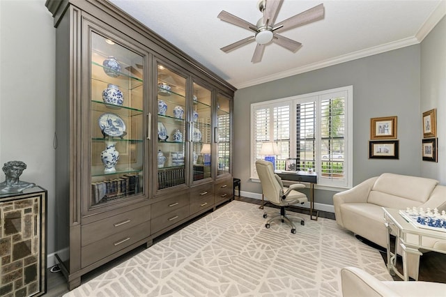 office area featuring crown molding and ceiling fan