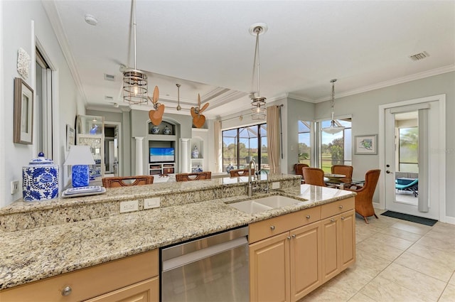 kitchen featuring sink, light stone countertops, hanging light fixtures, and dishwasher