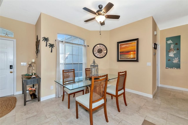 dining space featuring ceiling fan