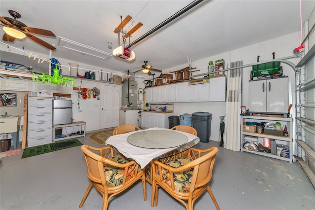 dining area with ceiling fan and concrete flooring