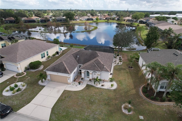 bird's eye view with a water view