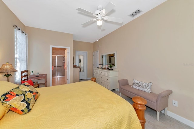 bedroom featuring a closet, a spacious closet, and ceiling fan