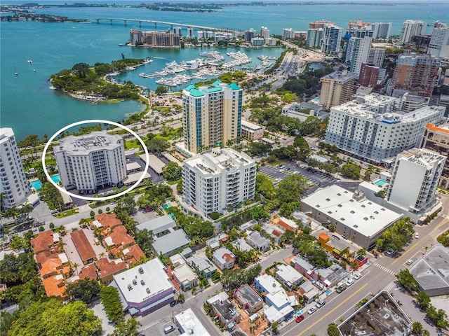 birds eye view of property featuring a water view