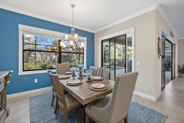 tiled dining room featuring ornamental molding and an inviting chandelier